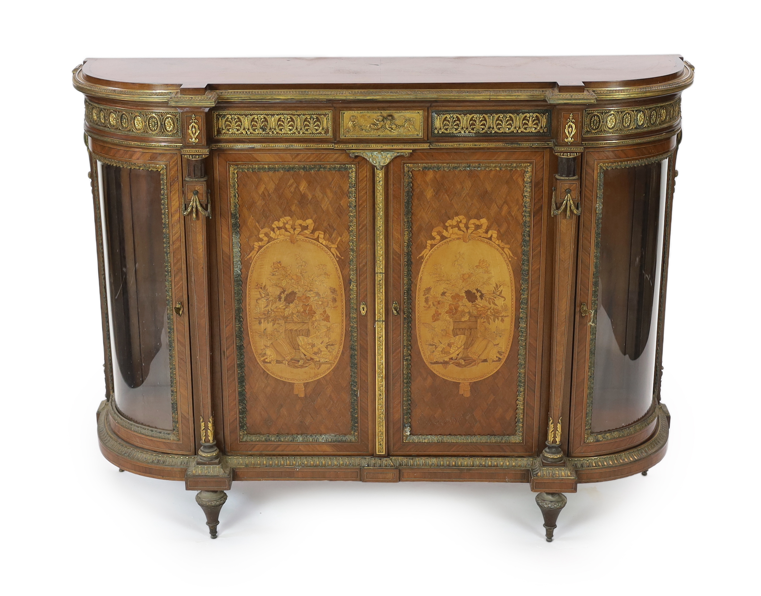 A late 19th century French Louis XVI style inlaid mahogany and ormolu mounted credenza
